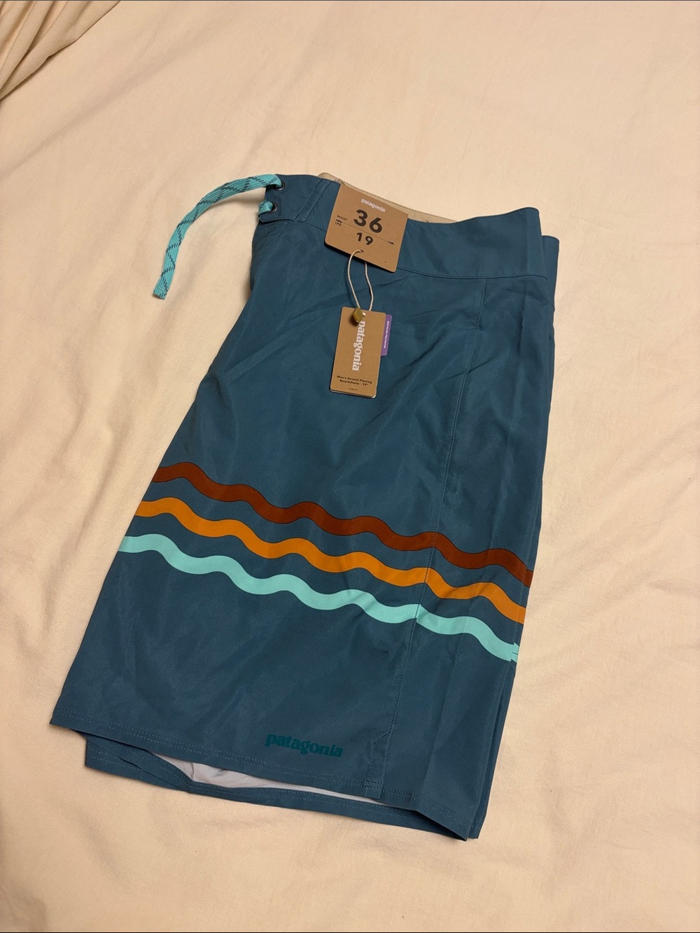 Patagonia Teal Hybrid Boardshorts with Retro Wave Stripes